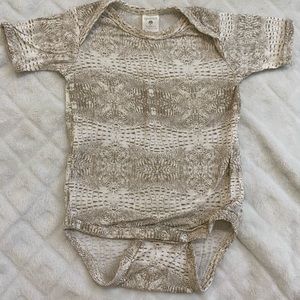 Kate Quinn short sleeve body suit